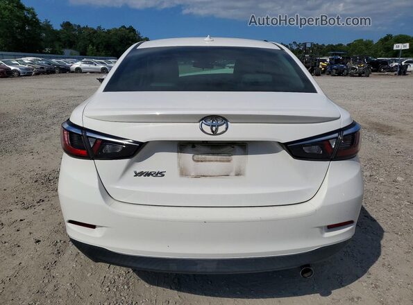 3MYDLBYV6KY522744 2019 TOYOTA YARIS White Հետևի տեսք