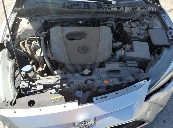 3MYDLBYV7HY181993 2017 TOYOTA YARIS Silver Rear interior view