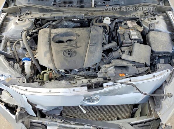3MYDLBYV7JY304715 2018 TOYOTA YARIS Silver Սալոնի հետևի տեսք
