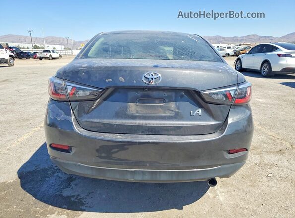 3MYDLBYVXHY184581 2017 TOYOTA YARIS Gray უკანა ხედი