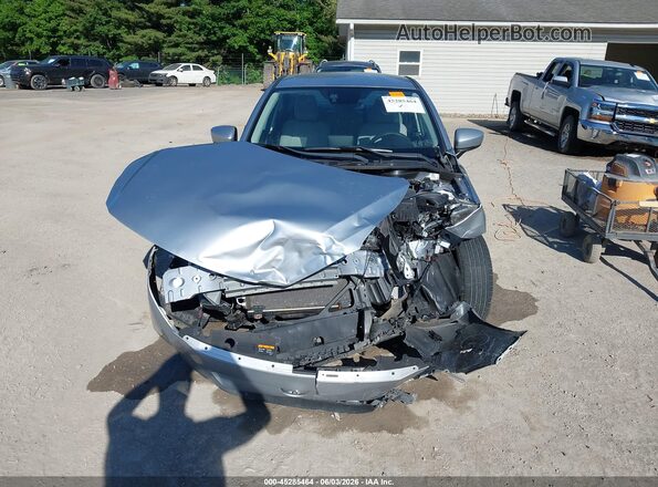 3MYDLBYVXKY502996 2019 TOYOTA YARIS Silver Սալոնի հետևի տեսք
