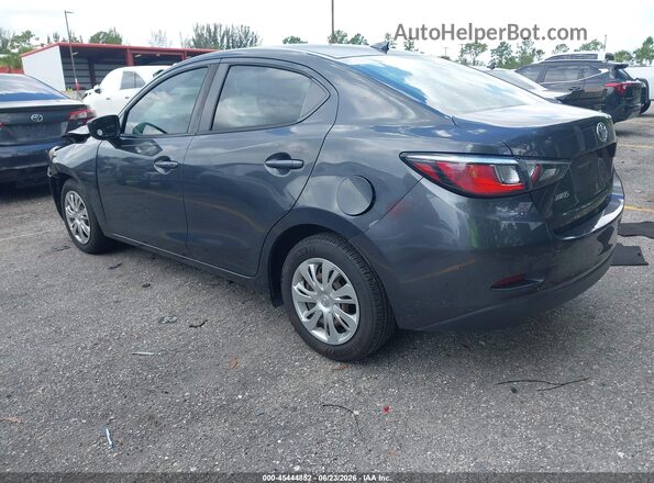 3MYDLBYVXKY516557 2019 TOYOTA YARIS Gray Trasero izquierdo