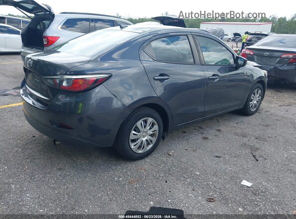 3MYDLBYVXKY516557 2019 TOYOTA YARIS Gray Trasero derecho