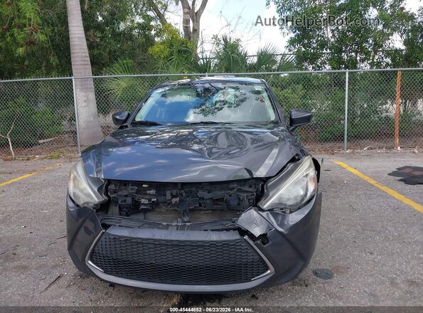 3MYDLBYVXKY516557 2019 TOYOTA YARIS Gray Vista interior trasera