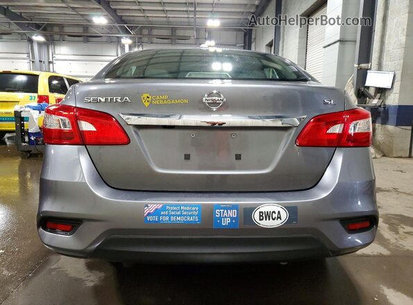 3N1AB7AP0JY221689 2018 NISSAN SENTRA Gray Rear view