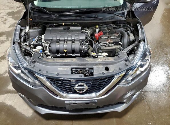 3N1AB7AP0JY221689 2018 NISSAN SENTRA Gray Rear interior view
