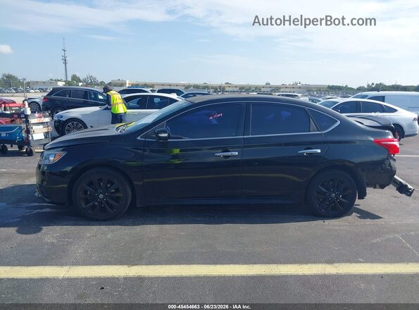 3N1AB7AP0JY252957 2018 NISSAN SENTRA Black Вид задньої частини салону