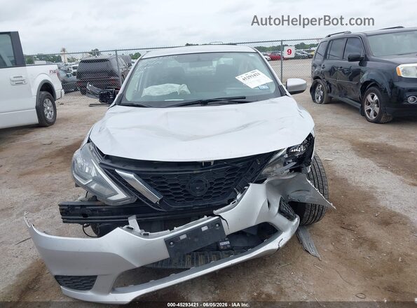 3N1AB7AP0JY255003 2018 NISSAN SENTRA Серебряный Вид задней части салона