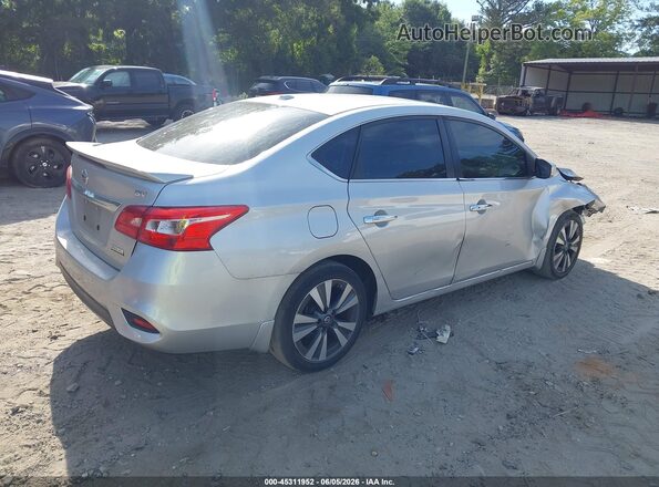 3N1AB7AP0KY344569 2019 NISSAN SENTRA Silver Trasero derecho