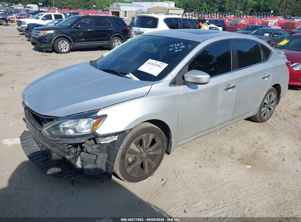 3N1AB7AP0KY344569 2019 NISSAN SENTRA Silver Vista tres cuartos delantera izquierda