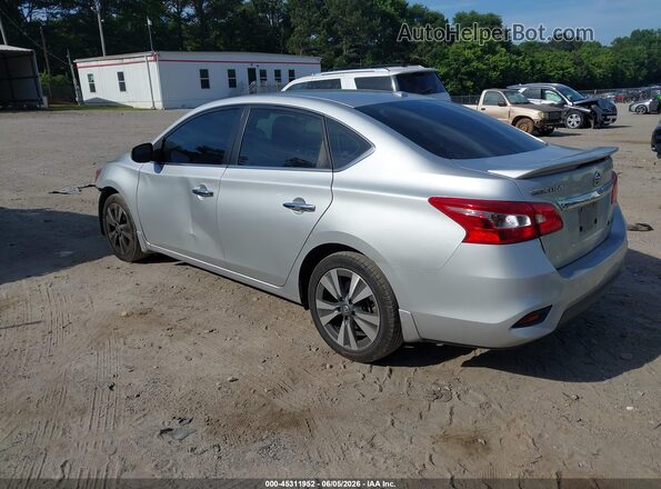 3N1AB7AP0KY344569 2019 NISSAN SENTRA Silver Trasero izquierdo