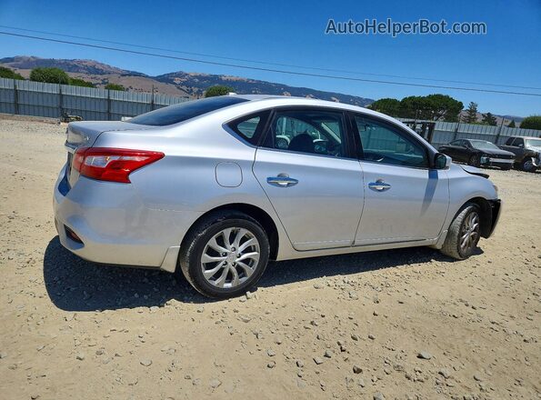 3N1AB7AP0KY360643 2019 NISSAN SENTRA Серебряный Задняя правая четверть