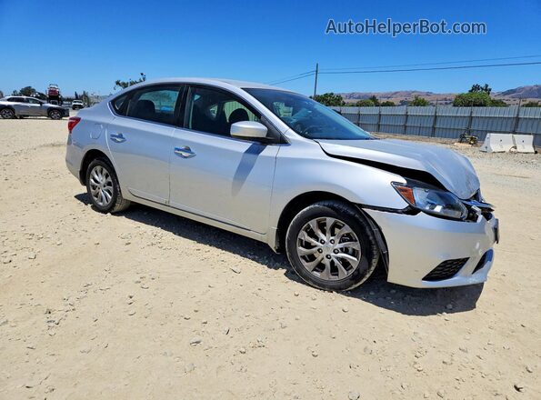 3N1AB7AP0KY360643 2019 NISSAN SENTRA Серебряный Передняя правая четверть