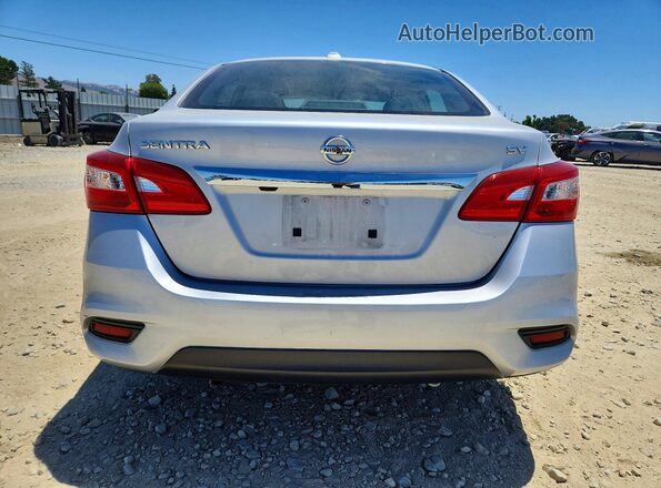 3N1AB7AP0KY360643 2019 NISSAN SENTRA Серебряный Вид сзади