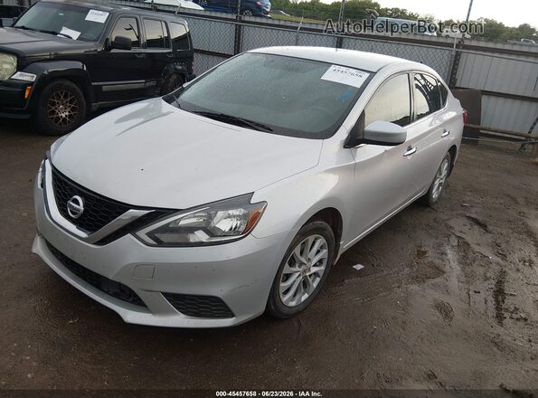 3N1AB7AP1JL631592 2018 NISSAN SENTRA Silver Vista tres cuartos delantera izquierda