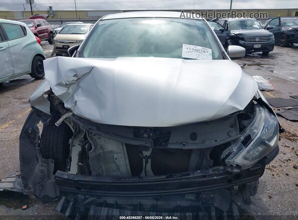 3N1AB7AP1JY254071 2018 NISSAN SENTRA Silver Вид щитка приладів