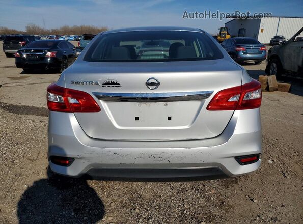 3N1AB7AP1JY289063 2018 NISSAN SENTRA Silver Вид ззаду