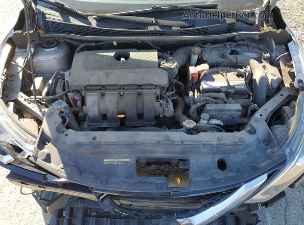 3N1AB7AP1JY289063 2018 NISSAN SENTRA Silver Вид задньої частини салону