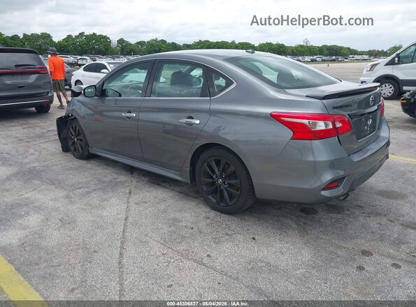 3N1AB7AP1JY290004 2018 NISSAN SENTRA Gray Trasero izquierdo