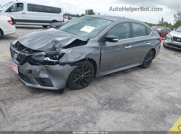 3N1AB7AP1JY290004 2018 NISSAN SENTRA Gray Vista tres cuartos delantera izquierda