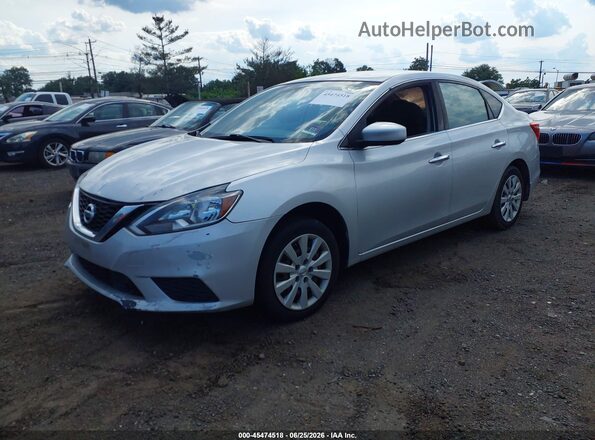 3N1AB7AP1JY308694 2018 NISSAN SENTRA Silver Vista tres cuartos delantera izquierda