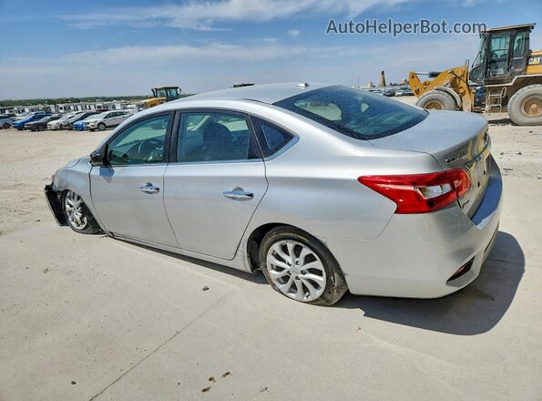 3N1AB7AP1KL606337 2019 NISSAN SENTRA Серебряный Задняя левая четверть