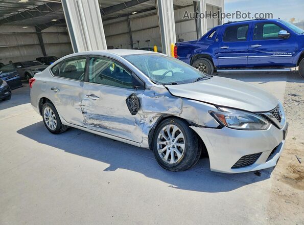 3N1AB7AP1KL606337 2019 NISSAN SENTRA Серебряный Передняя правая четверть