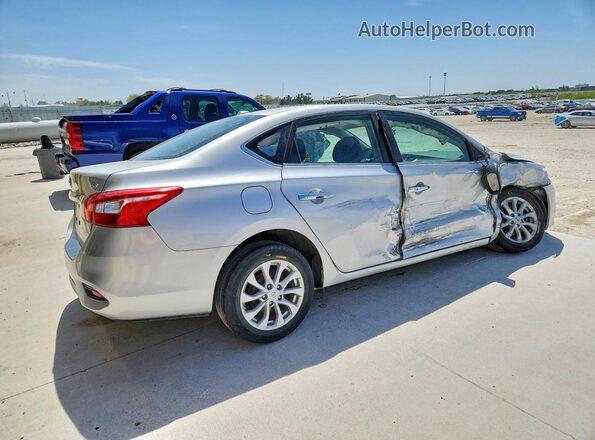 3N1AB7AP1KL606337 2019 NISSAN SENTRA Серебряный Задняя правая четверть