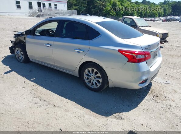 3N1AB7AP1KY255996 2019 NISSAN SENTRA Silver Trasero izquierdo