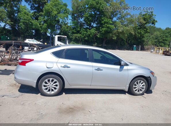 3N1AB7AP1KY255996 2019 NISSAN SENTRA Silver Vista interior trasera