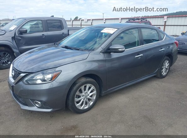 3N1AB7AP1KY346914 2019 NISSAN SENTRA Gray Vista tres cuartos delantera izquierda