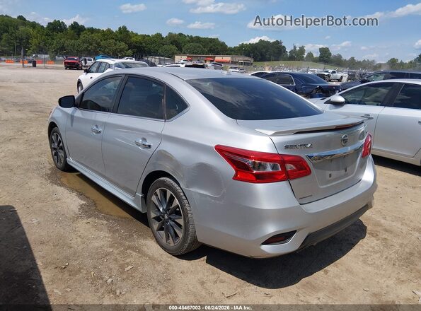 3N1AB7AP2GY279795 2016 NISSAN SENTRA Silver Trasero izquierdo