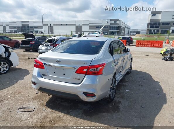 3N1AB7AP2KY429283 2019 NISSAN SENTRA Серебряный Задняя правая четверть