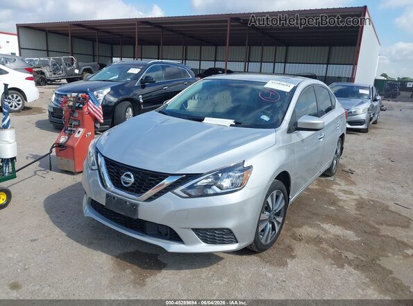 3N1AB7AP2KY429283 2019 NISSAN SENTRA Серебряный Передняя левая четверть