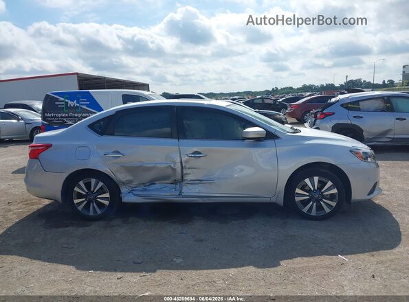3N1AB7AP2KY429283 2019 NISSAN SENTRA Серебряный Вид задней части салона