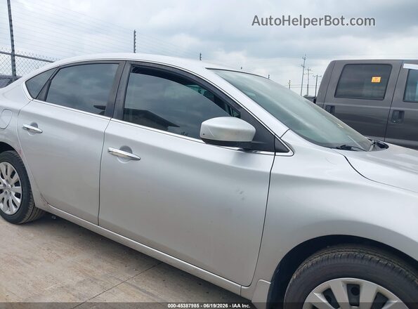 3N1AB7AP2KY449839 2019 NISSAN SENTRA Серебряный Вид задней части салона