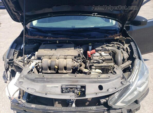 3N1AB7AP4JY288585 2018 NISSAN SENTRA Black Rear interior view