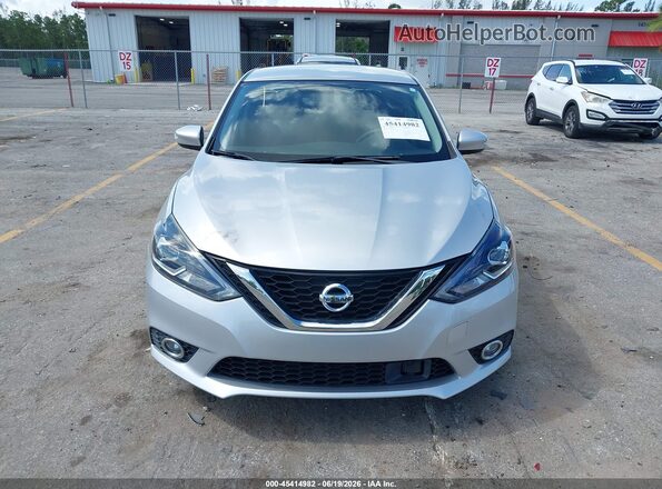 3N1AB7AP4JY347621 2018 NISSAN SENTRA Silver Rear interior view