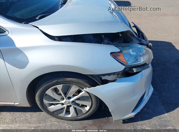 3N1AB7AP5JY297490 2018 NISSAN SENTRA Silver Rear interior view