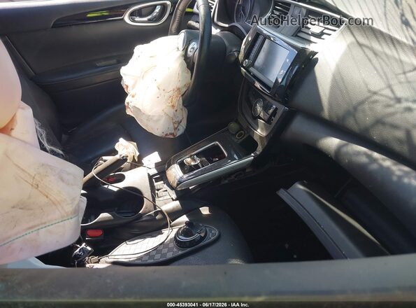 3N1AB7AP5KY427527 2019 NISSAN SENTRA Silver Front interior view