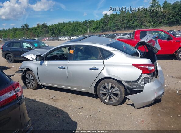 3N1AB7AP5KY427527 2019 NISSAN SENTRA Silver Rear interior view