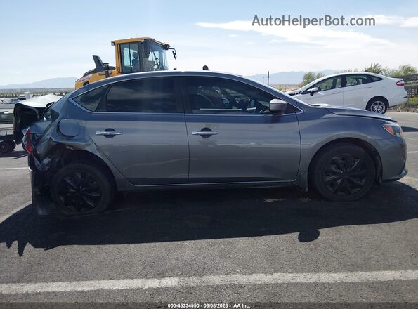 3N1AB7AP6JY278026 2018 NISSAN SENTRA Серый Вид щитка приборов