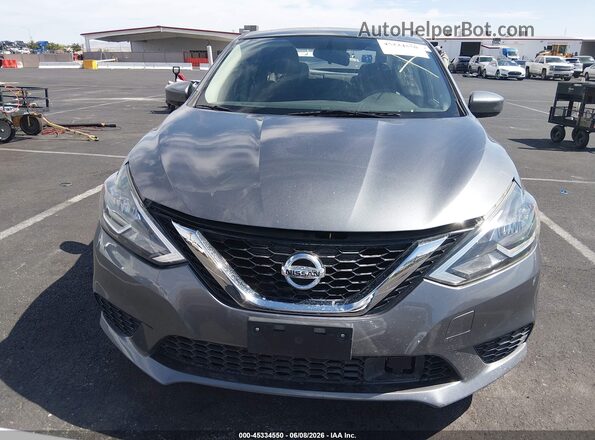 3N1AB7AP6JY278026 2018 NISSAN SENTRA Серый Вид панели приборов