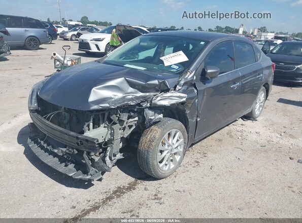 3N1AB7AP6KY234030 2019 NISSAN SENTRA Gray Vista tres cuartos delantera izquierda