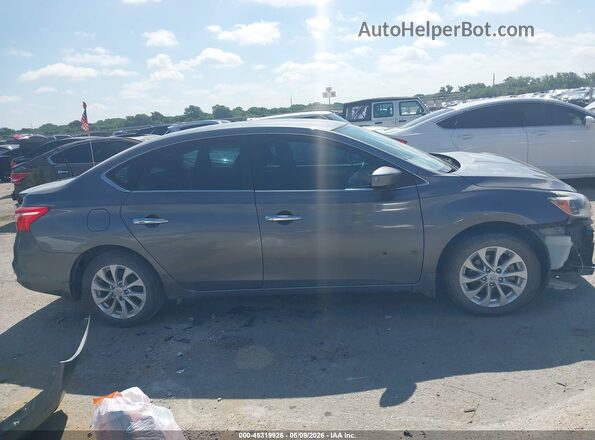 3N1AB7AP6KY234030 2019 NISSAN SENTRA Gray Vista interior trasera