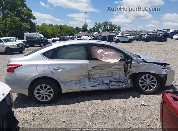 3N1AB7AP6KY252334 2019 NISSAN SENTRA Silver უკანა სალონის ხედი