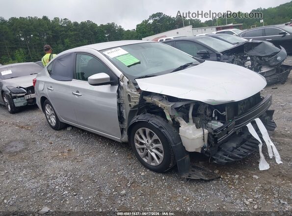3N1AB7AP7JL653547 2018 NISSAN SENTRA Silver Rear interior view