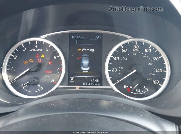 3N1AB7AP7JY277029 2018 NISSAN SENTRA Silver Rear seats view