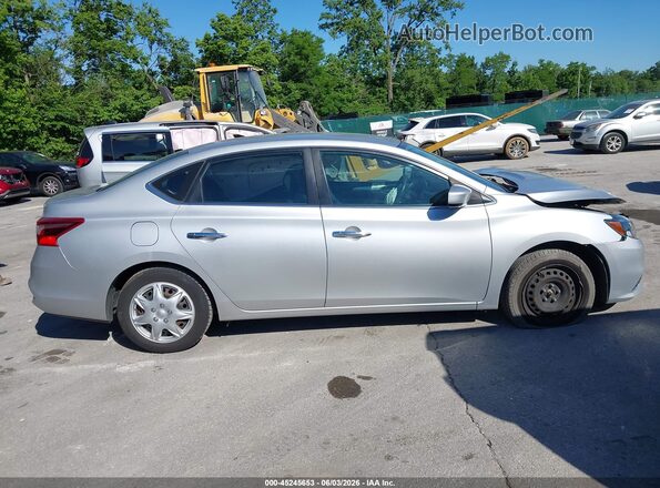 3N1AB7AP7JY277029 2018 NISSAN SENTRA Silver Rear interior view