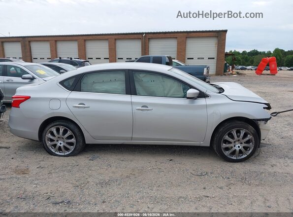 3N1AB7AP7KY267134 2019 NISSAN SENTRA Серебряный Вид задней части салона